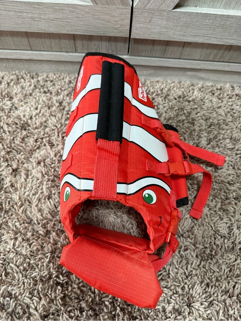 Nemo design  small dog Life Vest with orange/White Stripes (XS) outward hound